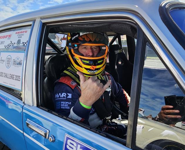 New Zealand race car driver Greg Murphy competed in various cars during the event — he is seen...