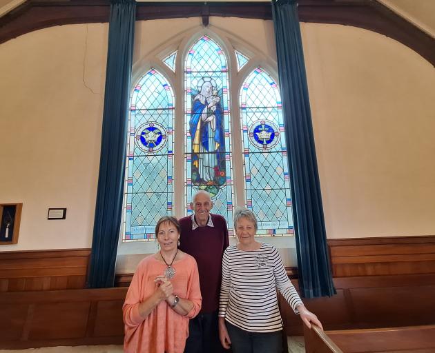 Isla Bank Church parishioners (from left) Ashley McCrostie, Tony Strang and Annette Horrell stand...