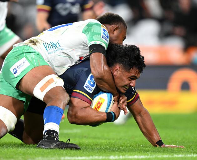 Tanielu Tele'a of the Highlanders dives towards the tryline to score during tonight's Super Rugby...