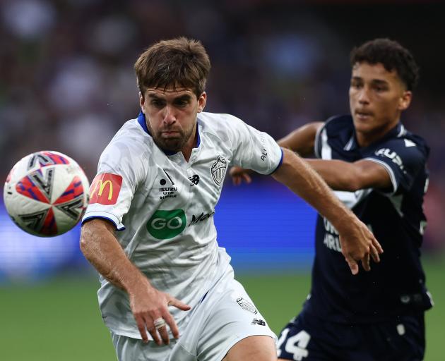 Guillermo May of Auckland FC (left) scored late in Auckland FC's win against Melbourne Victory in...