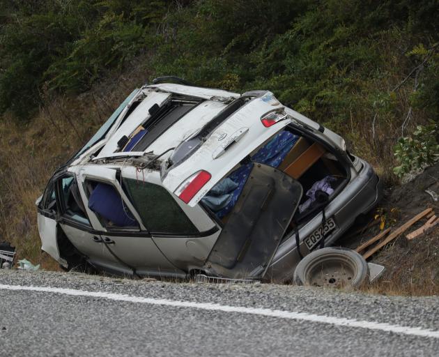 A van was badly damaged after a crash near Lake Hāwea. PHOTO: RAWAN SAADI