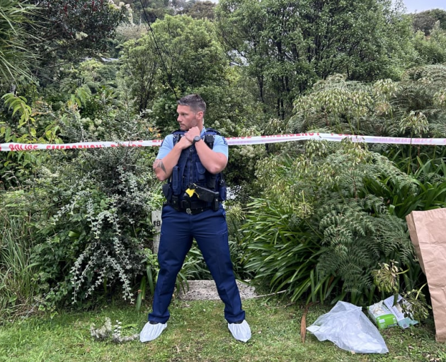 Wellington police at the scene in Albemarle Road, Northland, where a man was found dead outside a...