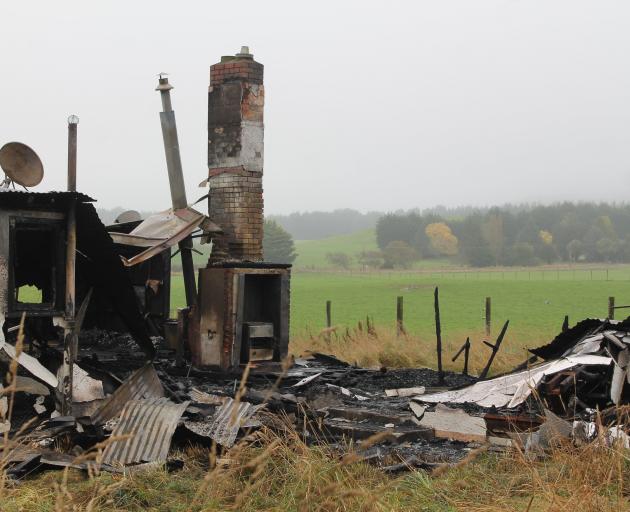 An unoccupied farmhouse burned down last week in Otaraia, Southland. PHOTO: ELLA SCOTT-FLEMING