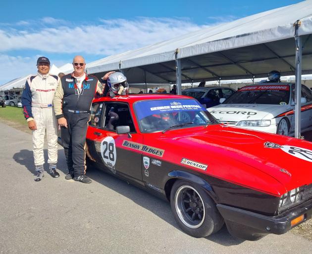 George Begg Festival director Scott O’Donnell with former racer Brett Riley before getting on to...
