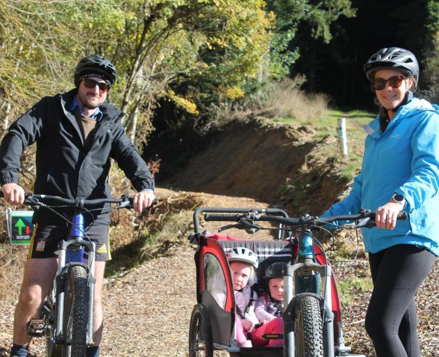 Ready to test out the new Waikaia forest tracks are Benji and Zoe Gillespie with their daughters...
