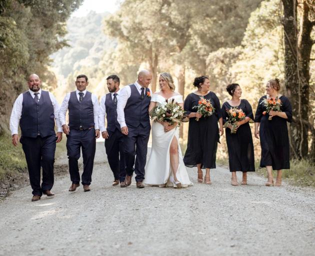 The bridal party (from left): Shannon Robinson, Raukura Karena, Damon Topi, Zac Andrews, Kendra...