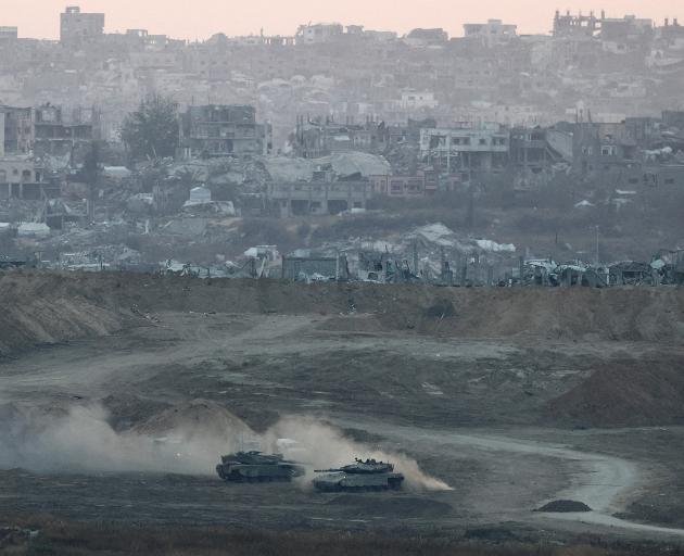 Israeli tanks operating near the Gaza border. Photo: Reuters 