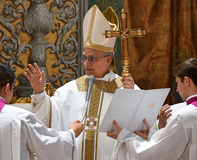 Pope Leo XIV conducts Mass in the Sistine Chapel at the Vatican. Photo: Vatican Media/Reuters
