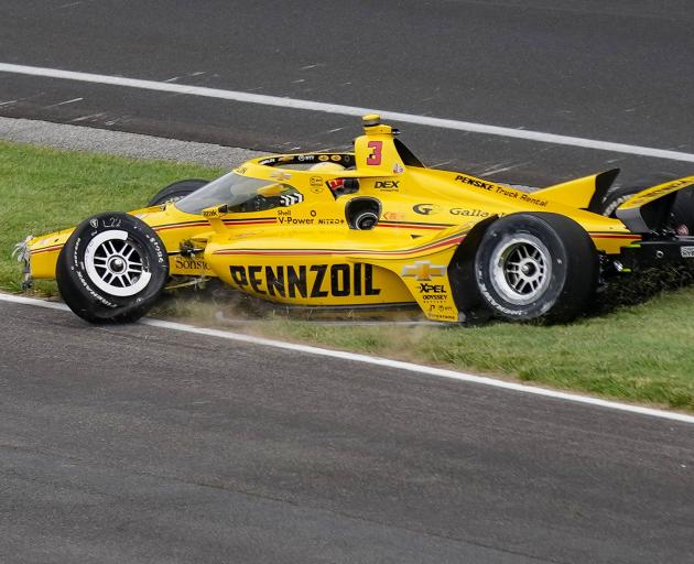 Scott McLaughlin’s Indy 500 ends early. PHOTO: REUTERS