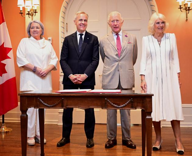 From left: Canada's Governor-General Mary Simon, Prime Minister Mark Carney, King Charles and...