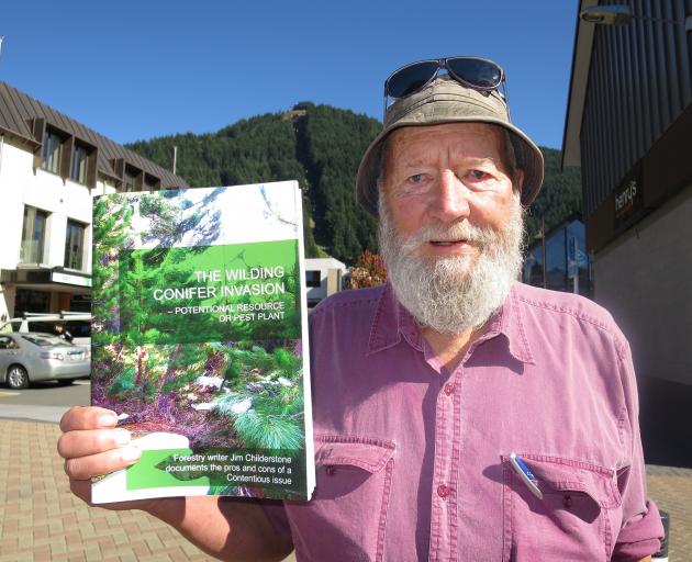 Jim Childerstone with his book decrying wilding pine ‘fundamentalists’. PHOTO: ARCHIVE