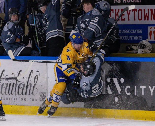 SkyCity Stampede’s Connor Harrison helps Mako’s Markus MacDonald get some air time during the...