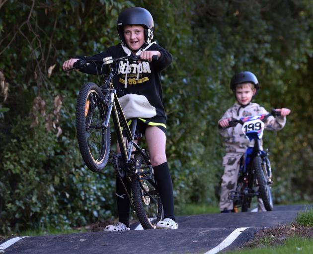 Macandrew Bay pupils Jack Mooney, 11, (front) and Connor Blair, 5, try out their school’s new...