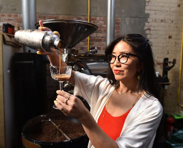 Celeste Wong pours a coffee Margarita at Grid Coffee in Dunedin during her recent visit to see...
