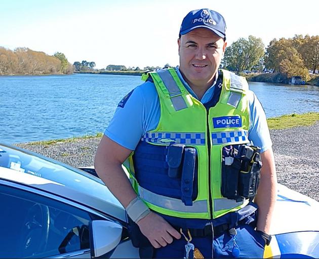 Balclutha police sergeant Tim Coudret stands by the Clutha River. PHOTO: NICK BROOK