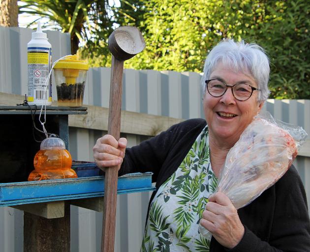 Kaka Point Local Legend Christene Dennison brandishes her fresh lamb roast along with her wasping...