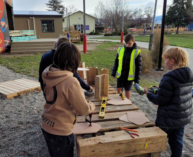 Primary school pupils are working with male mentors to reinvent pallets in cool DIY projects....