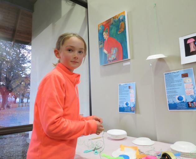 Enjoying one of the arts and crafts activities on offer during the evening is 8-year-old Scarlett...