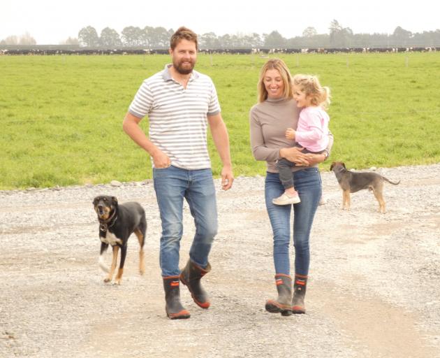 Canterbury sharemilkers Braden and Brigitte (Biddy) Barnes with youngest daughter, Ginny, 2, want...