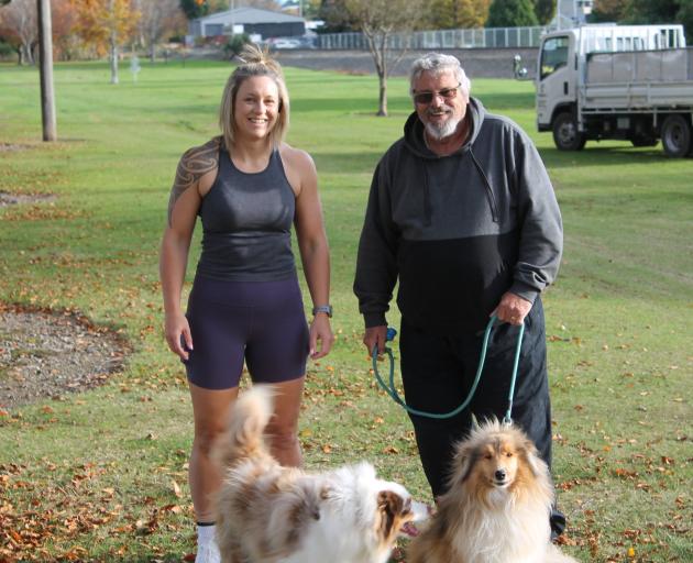 Kirsty Quertier and her dog Ardie (left) catch up with her father Paul Ware and his dog Willow...