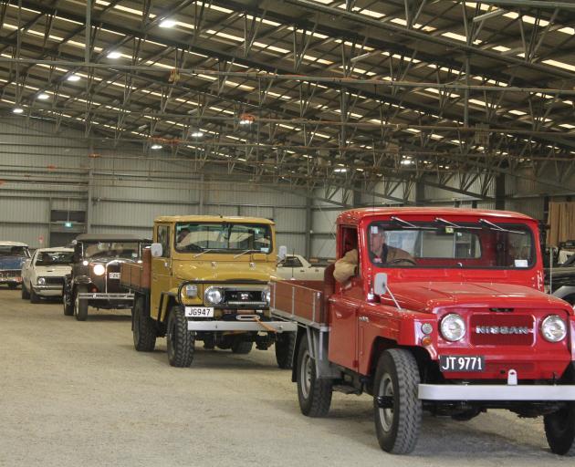 The utes begin their convoy out of Waimumu's Southern Field Days site, before heading along the...