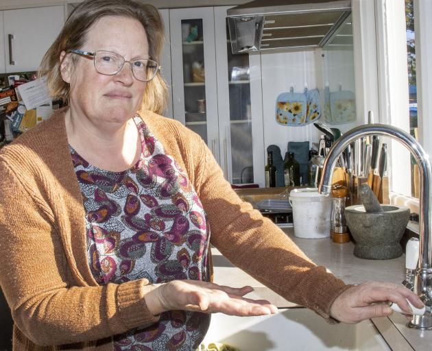 Claire Burridge and Grange St residents have dealt with about a dozen water outages since 2022....