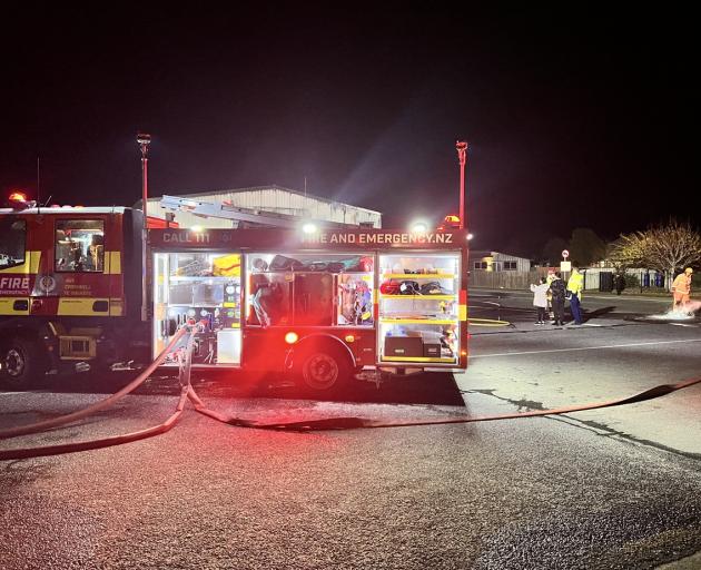 Firefighters at the scene in Cromwell. Photo: Kim Bowden