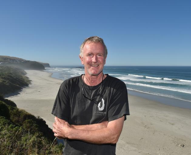 Jim Fyfe, pictured at Tomahawk Beach, has spent the past 26 years working with sea lions and...