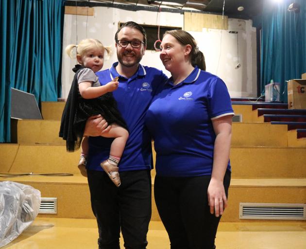 Grace and Chris Rottenberry, holding their daughter Mia, 2, are delighted a third theatre at The...