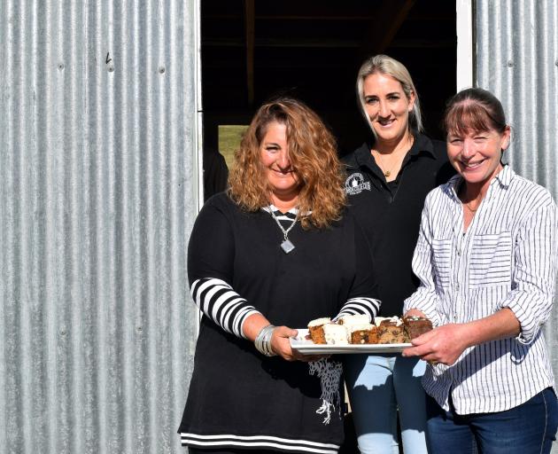 Serving food at the North Otago Centre Championships in Patearoa last week are (from left)...