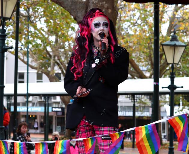 Genderqueer performer Ann Arkii speaks during Saturday’s event. PHOTOS: SAM HENDERSON