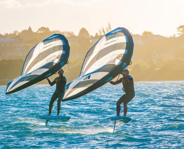 Daz Charteris (left) and Brad Dennison catch the wind on Caroline Bay.

