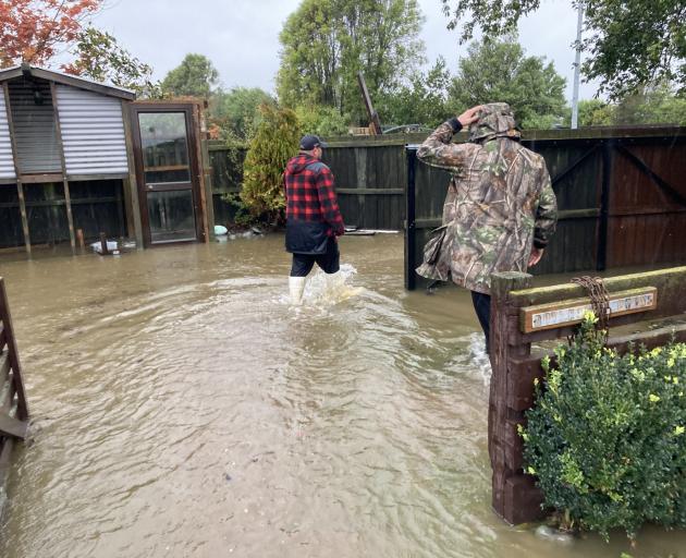 The council distributed sandbags to specific houses in the areas of West Melton, Doyleston, and...