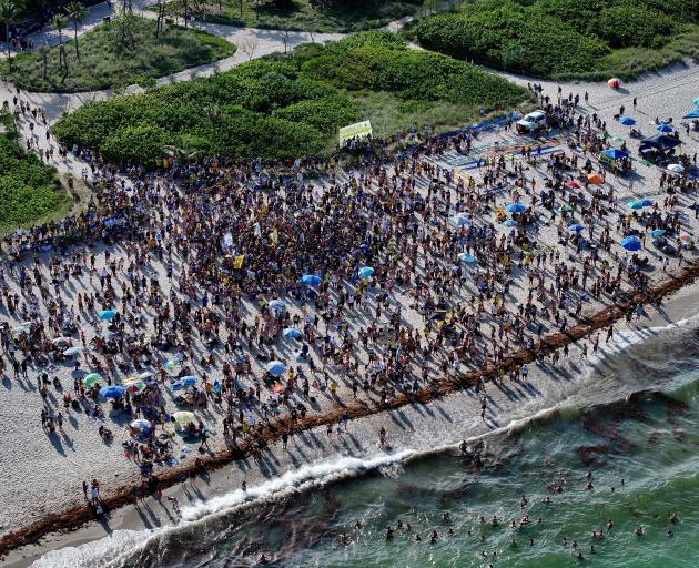 Boca Juniors fans cram Miami Beach before their side’s 2-2 draw against Benfica in the Club World...
