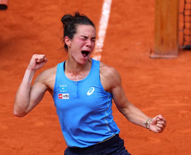 France's Lois Boisson celebrates winning her fourth round match against Jessica Pegula. Photo:...