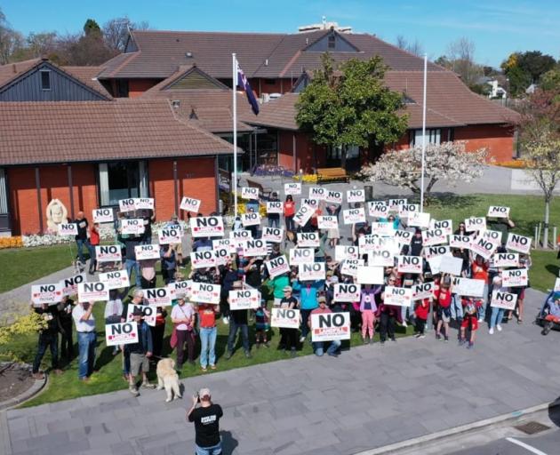 A drone image showing protestors on the Waimakariri District Council lawn in Rangiora last year....