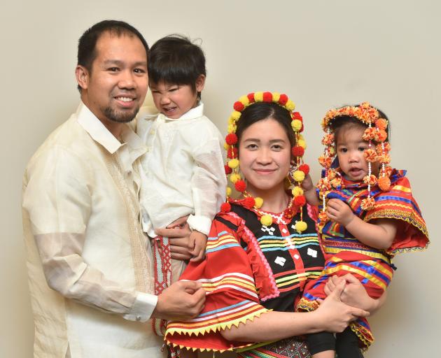New citizens of New Zealand (from left) Retzy Cariaga, Raniel Cariaga, 3, Danelie Flores and...