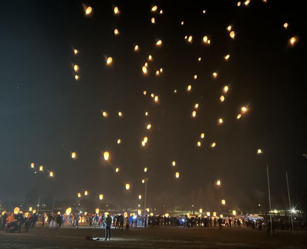 The sky glows as 700 lanterns lift off at the finale of the Cromwell Promotions Light Up Winter...