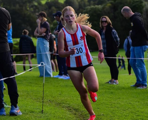 Millie McFadzien competes last Saturday at the New Zealand Secondary Schools Cross-Country...
