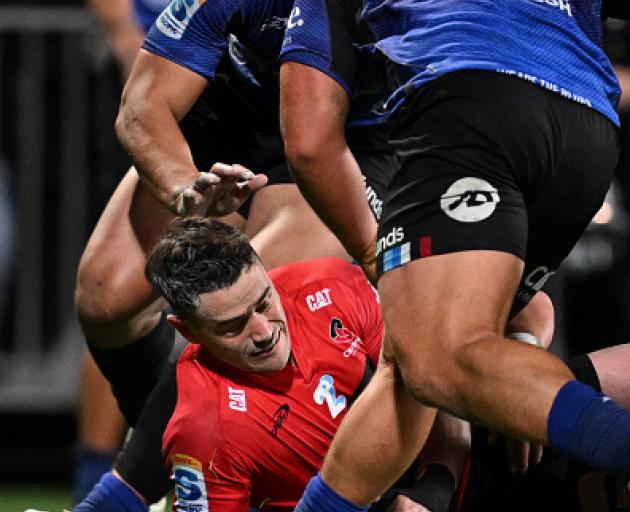 Will Jordan of the Crusaders scores a try during the semifinal match against the Blues. PHOTO:...