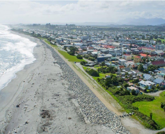 An aerial view of Hokitika looking north along the current seawall towards the northern...