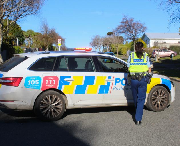 Police were armed in Invercargill yesterday, looking for a person seen holding what was thought...