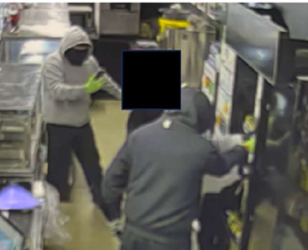 Three males entered the premises and allegedly threatened a worker. Photo: Police