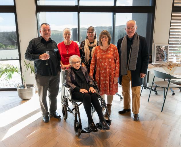 Olive, Lady Hutchins, pictured on her 100th birthday on Saturday in Queenstown, surrounded by her...