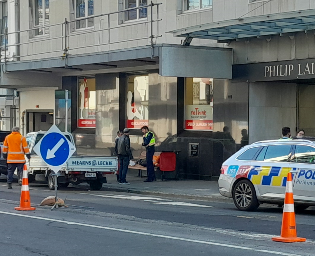 Police at the scene of the incident in Rattray St this afternoon. Photo: Bruce Munro