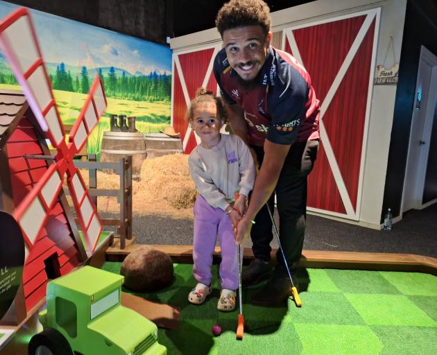 Alaya, 3, and her dad Southland Stags player Isaac Te Tamaki putt off at the Southland Stags...