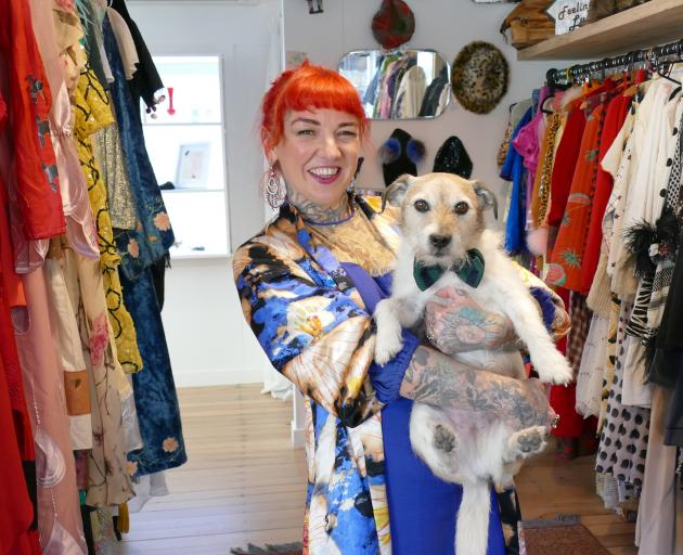 Vintage Liberation owner Claire Todd, with Rusty, in her new Country Lane store. PHOTO: TRACEY...