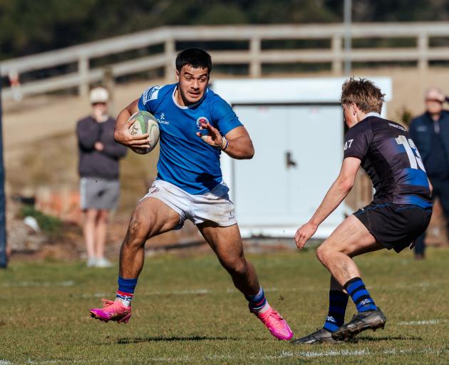 Southland Boys’ winger Zeke Hammond-Siolo looks for a way around Christchurch Boys’ centre during...
