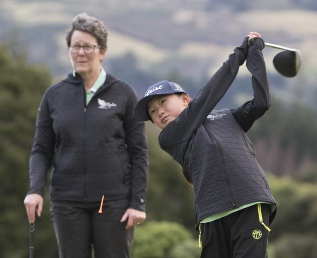 Joanna Ke and coach Shelley Duncan put in the hard yards on the practice fairway at Balmacewen....