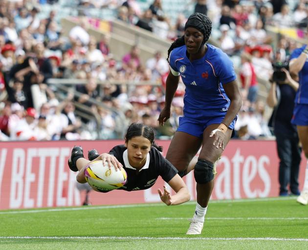 New Zealand's Braxton Sorensen-McGee scores against France in the third-place playoff at the...